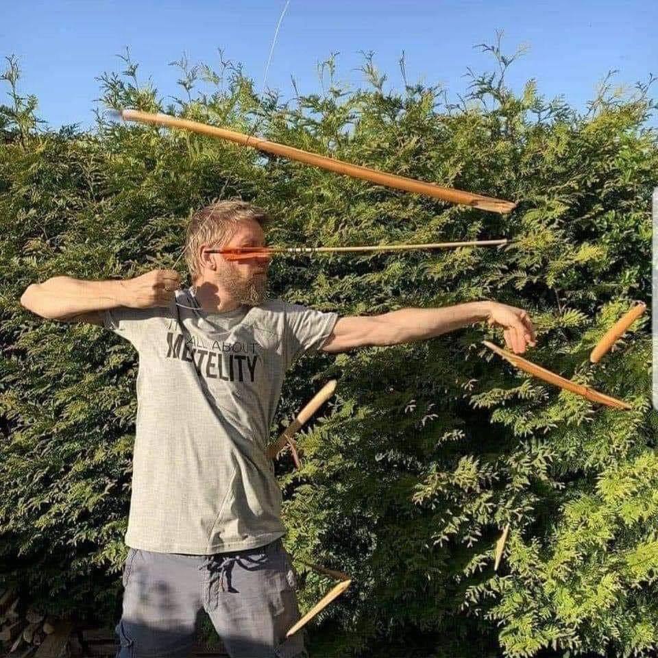 The meme is a photo of a man holding a bow and arrow, with his arms and legs stretched out in a comically exaggerated pose. The image is captioned "When you finally get a job". The meme is humorous because it takes a common experience (getting a job) and turns it into an absurd, over-the-top celebration.